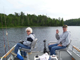 A friendly wave from the pontoon boat on Eagle Lake. We're out enjoying the weather, the company and the fishing is a bonus!