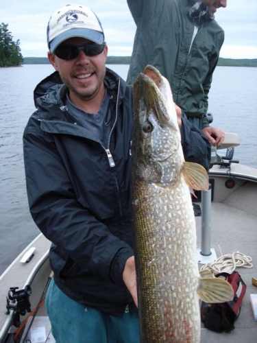 That's a huge Northern Pike. I'm sure he'll have quite the story to tell back at the cabin at Lost Island Lodge.