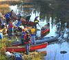 A canoe group packing up to hit the water again.